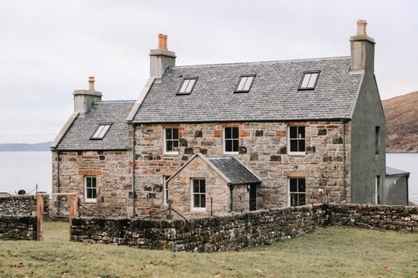 Stone house by the sea in the Scottish highlands