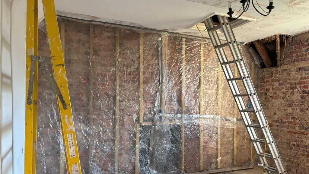 Bedroom being tented for drying activities